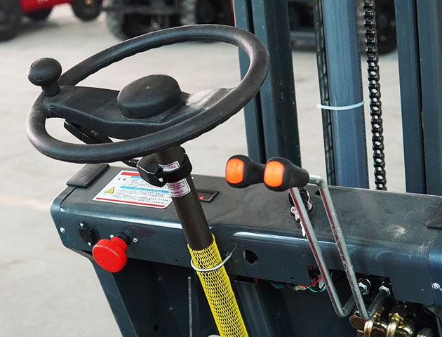 Close-up of Fangwei electric forklift control panel and steering wheel.